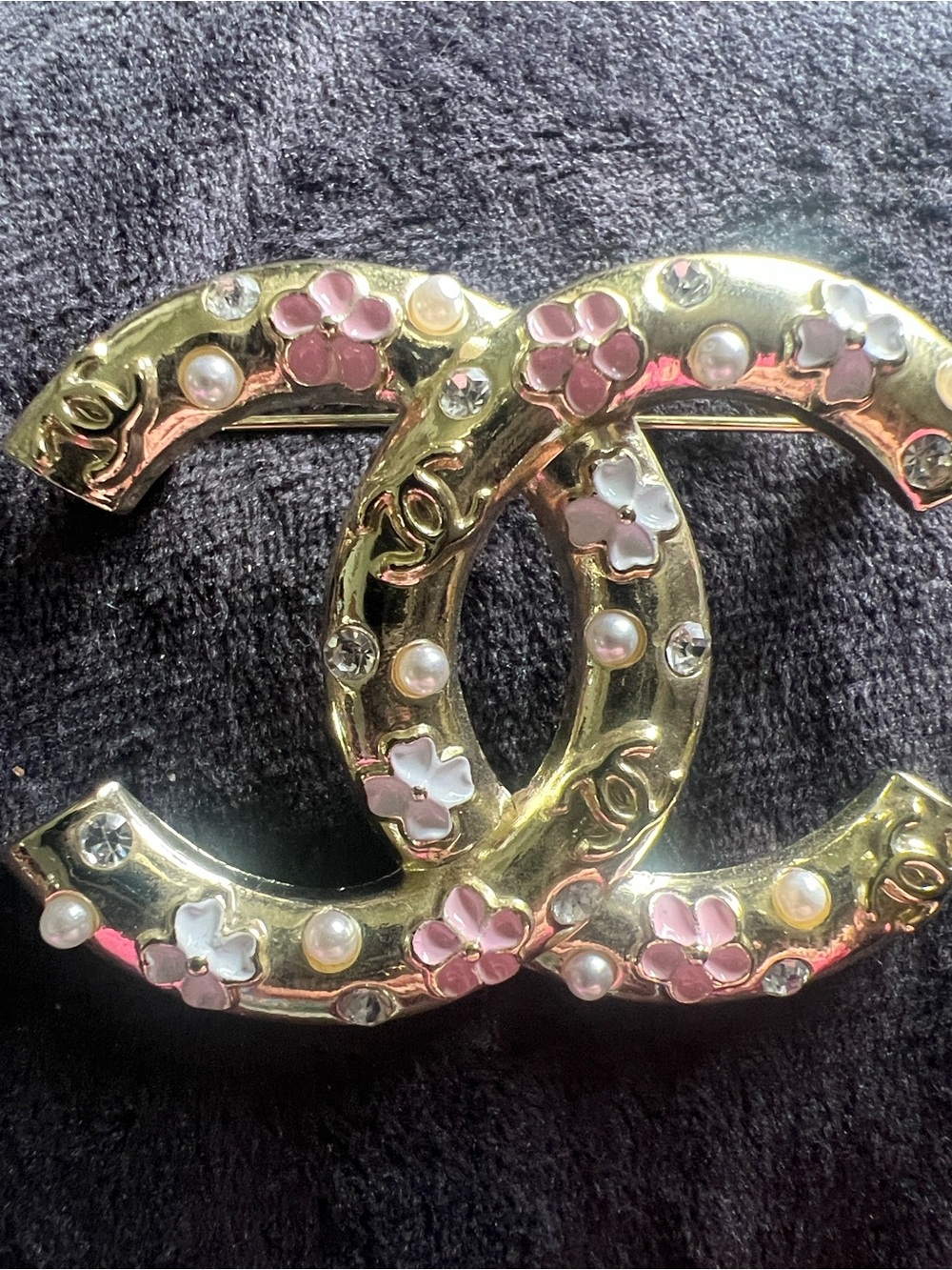 CHANEL Gold-Tone Double C Brooch with Pink and White Floral Accents